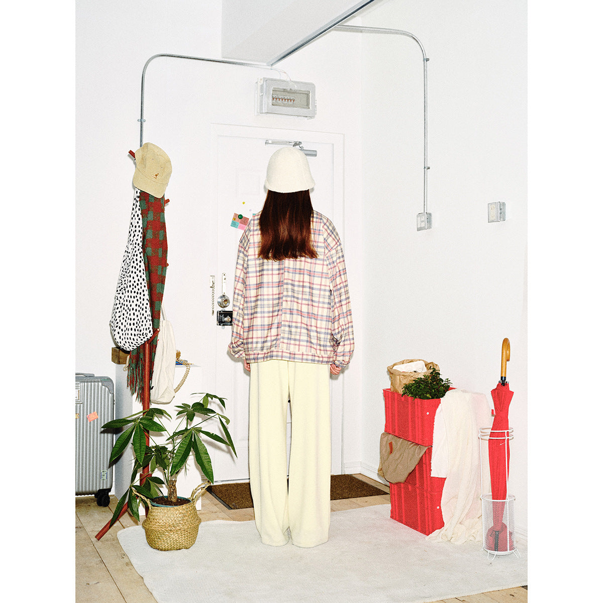 Women's lightly padded checkered boxy bomber jacket with drawstring hem, wooden bead cord and patch pockets Chichicherry