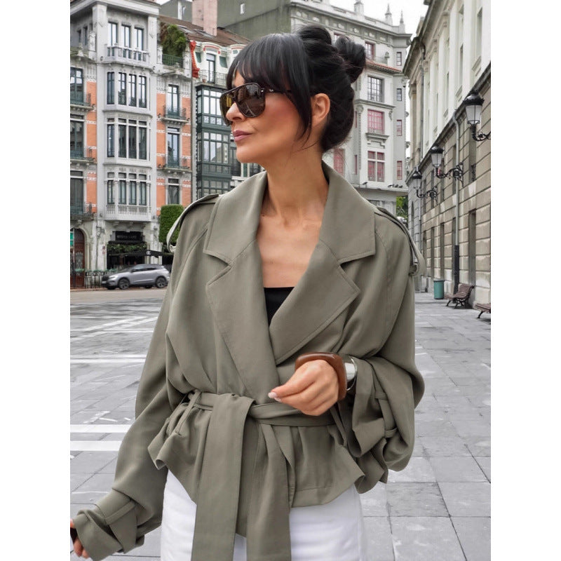 Women’s oversized trench jacket in cropped cut with tie belt, dropped shoulders, and balloon sleeves Chichicherry