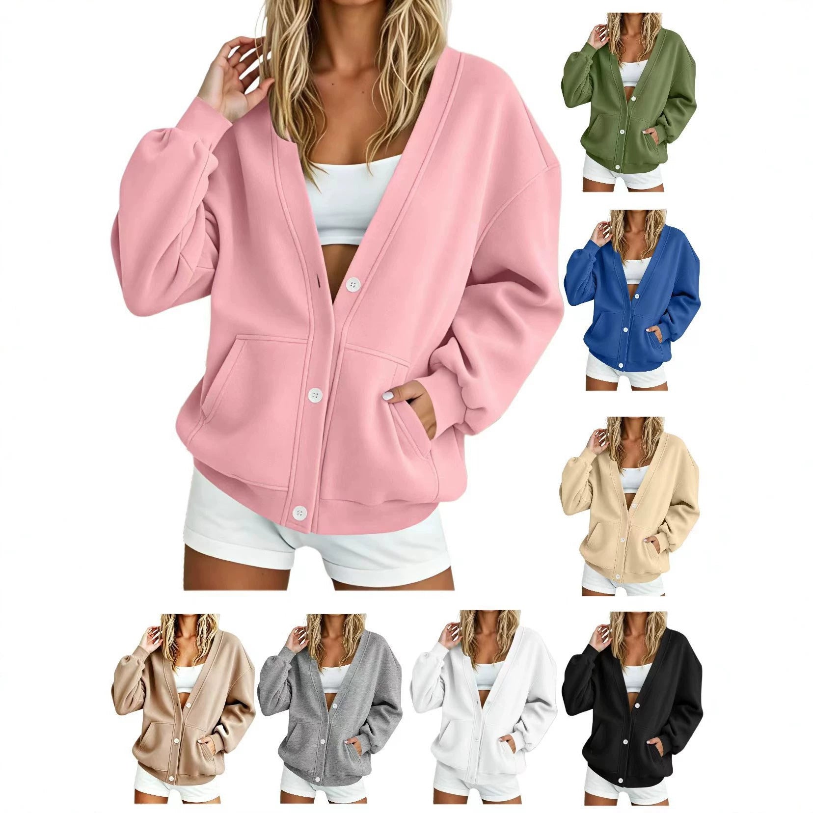 Women's oversized cardigan made of sweat fabric with V-neck, button placket, and kangaroo pockets.