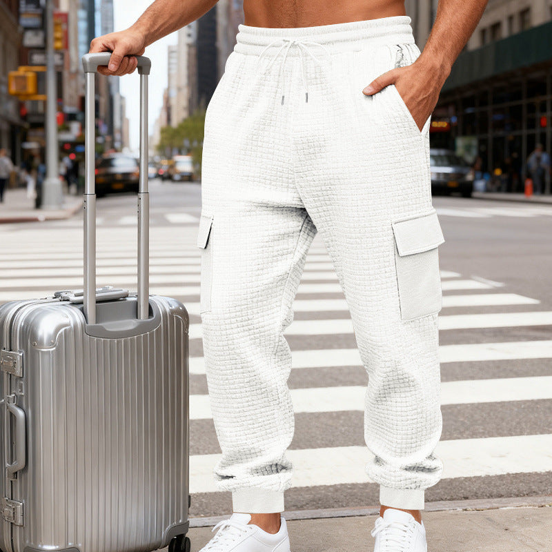 Men's cargo joggers with distinctive waffle texture, elastic waistband, and large flap pockets Chichicherry