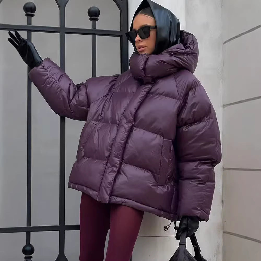 Ladies short padded oversized quilted jacket with high standing collar and hood Chichicherry