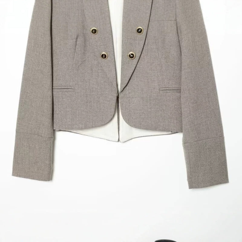 Women Cropped, tailored blazer with stand-up collar, double decorative button placket and asymmetrical hem Chichicherry