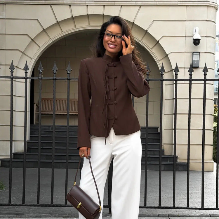 Women's fitted jacket with stand-up collar, Chinese knot fastenings, and slightly cropped cut.