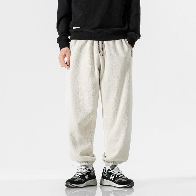 Men's wide-cut fleece jogging pants with elastic cuffs and side pockets Chichicherry