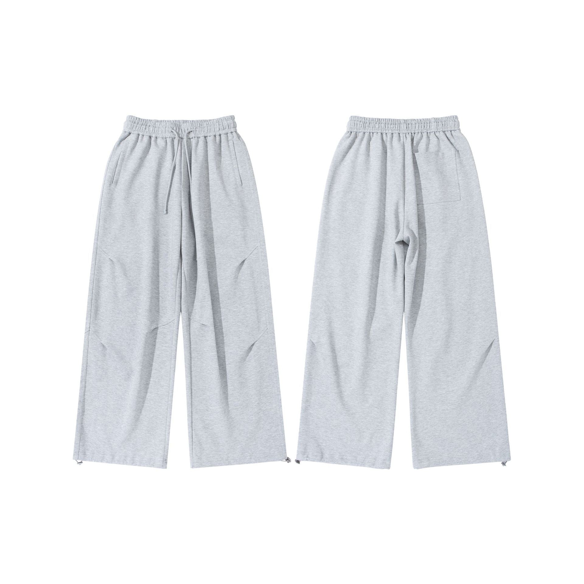 Unisex Wide French-Terry Sweatpants with elastic drawstring waistband, side pockets, and adjustable hem.
