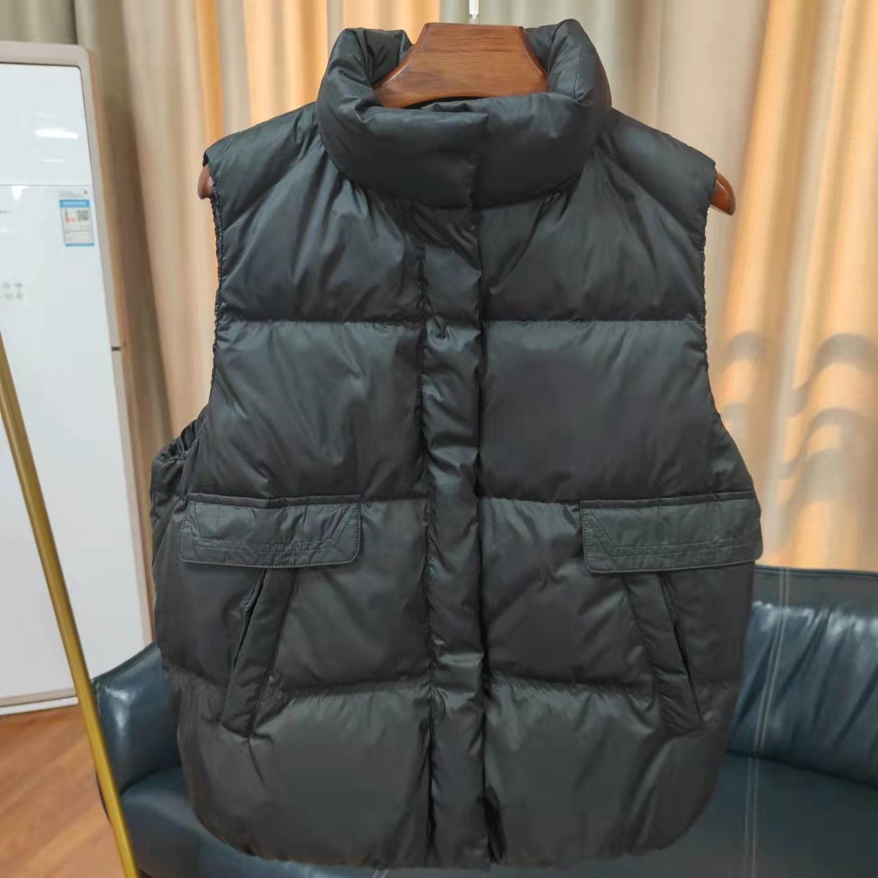 Women's quilted thermal vest with high stand-up collar and patch flap pockets Chichicherry