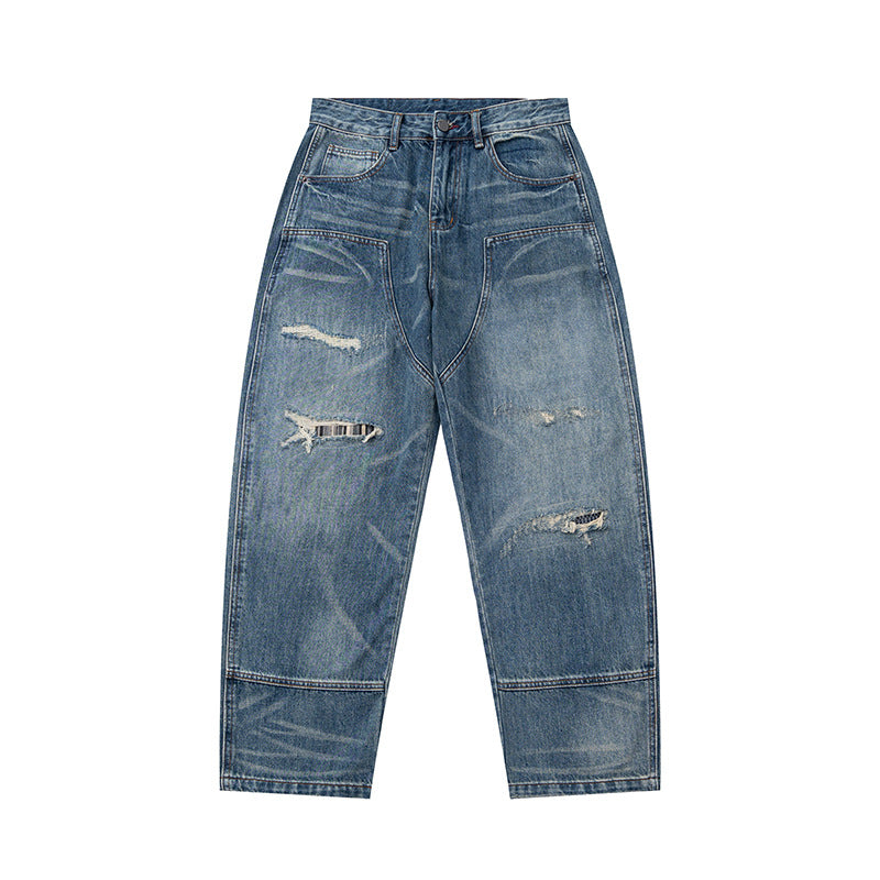 Women's high-waisted denim pants in a wide, cropped cut with a used effect and patch front pockets Chichicherry