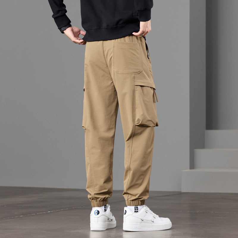 Men's technical cargo jogger pants with elastic hem, multi pockets, and drawstring Chichicherry