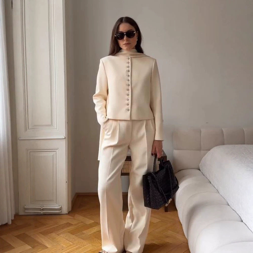Women Elegant fitted short blazer with standing collar and decorative button placket Chichicherry