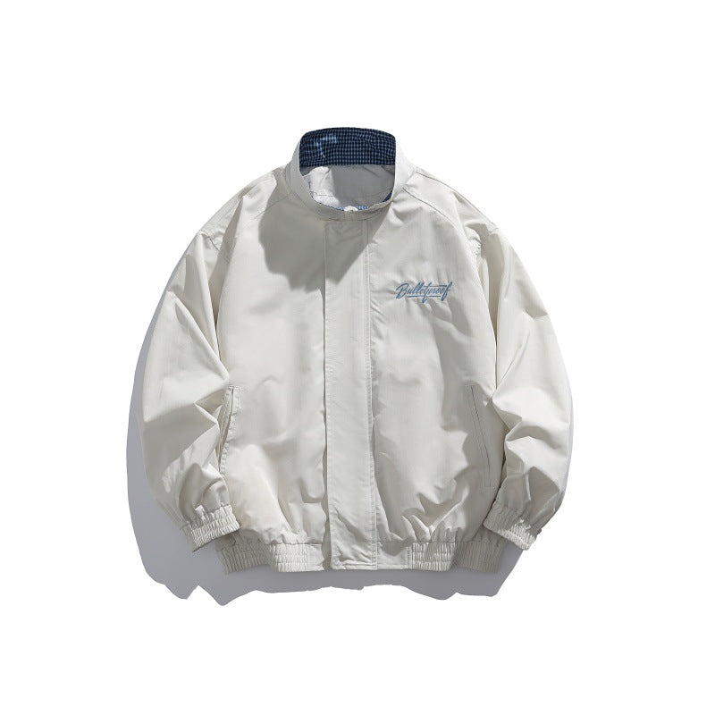 Unisex Lightweight Boxy Blouson Jacket with Stand-up Collar, Elastic Cuffs and Embroidered Chest Detail Chichicherry