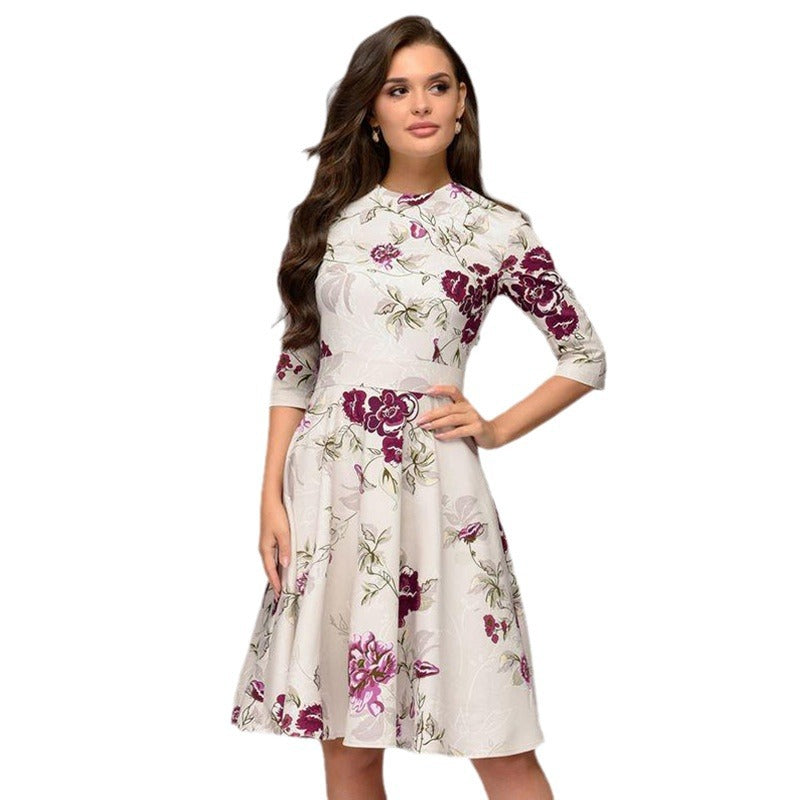 Women's A-line midi dress with 3/4 sleeves, fitted silhouette, and floral print Chichicherry