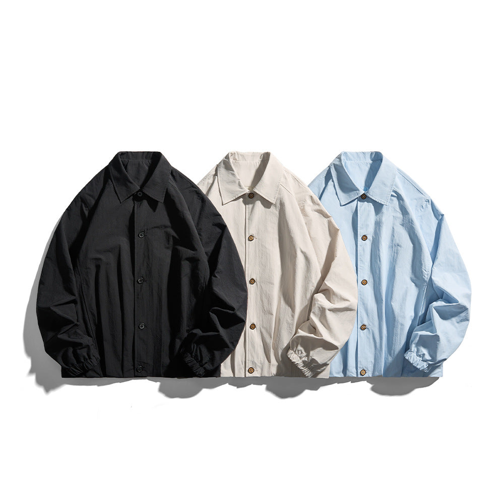 Unisex Lightweight Shirt Jacket in Boxy Cut with Wooden Button Placket and Elastic Cuffs Chichicherry