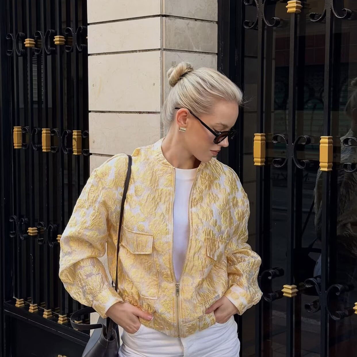 Women's short cut quilted bomber jacket with floral jacquard texture, elastic hem and patch pockets Chichicherry