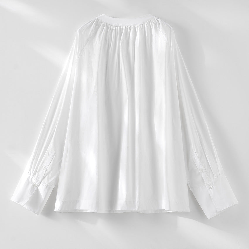 Women’s blouse with round neckline, full-button placket and gathered yoke Chichicherry