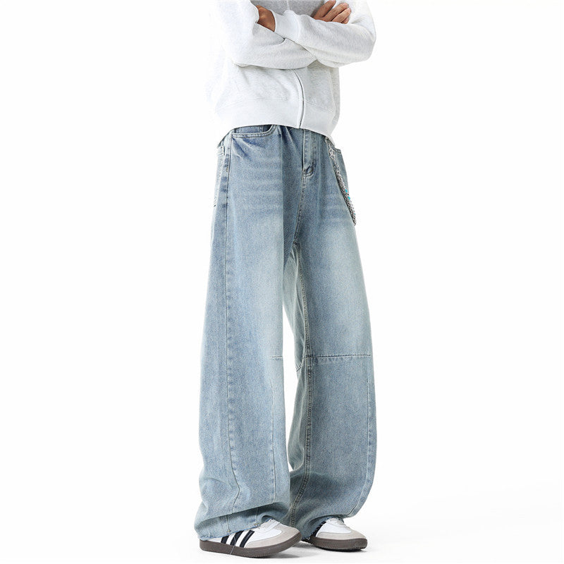 Men's wide-cut baggy jeans with high rise, knee darts, and distressed wash Chichicherry