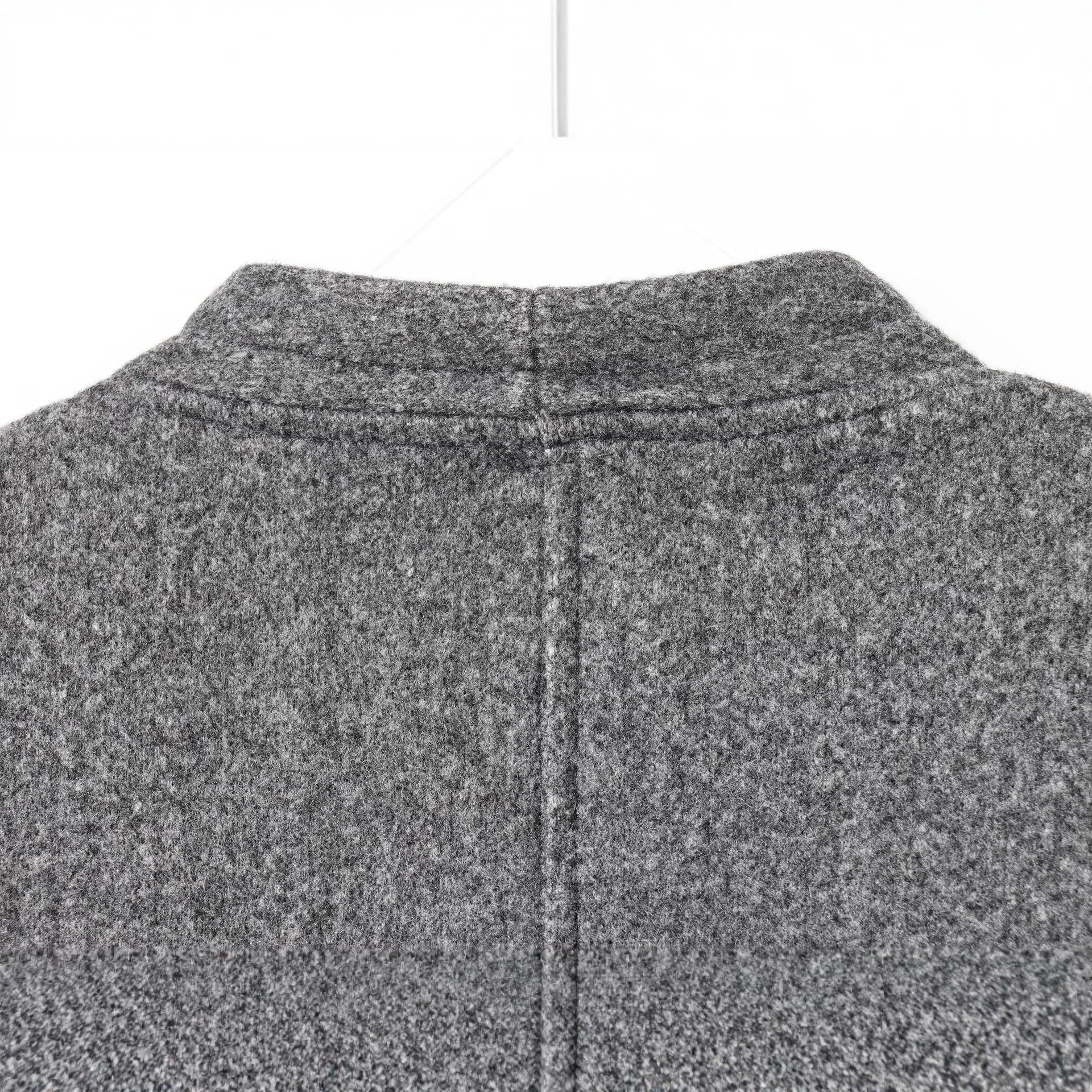 Women’s short jacket made of wool blend with round neck and decorative button placket Chichicherry