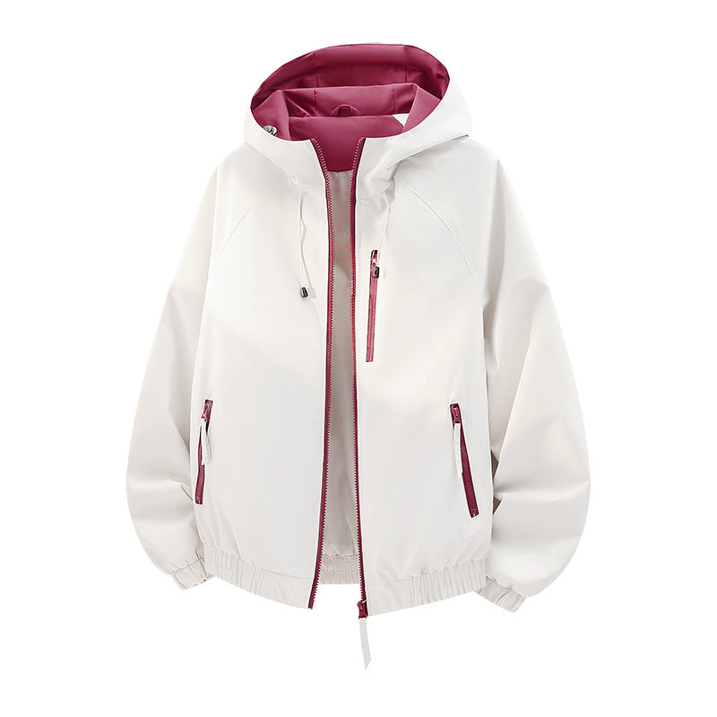 Women's lightweight hooded shell jacket in urban look with contrasting lining, zippered pockets, and elastic hem Chichicherry