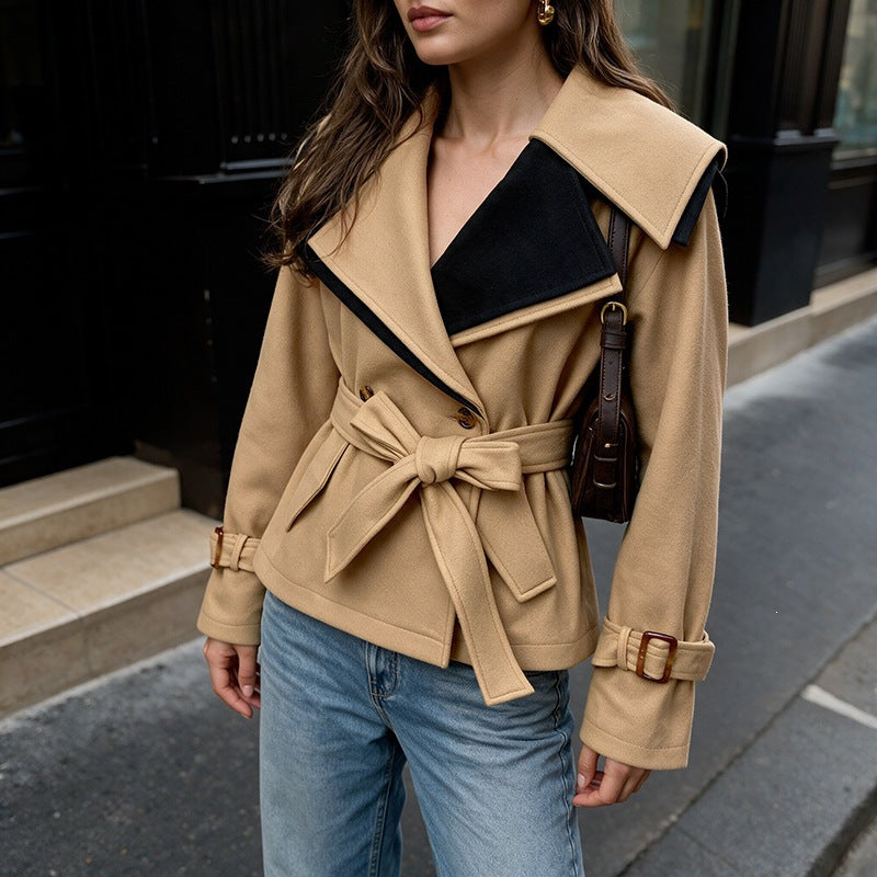 Women's short-cut wool blend coat with wide lapel collar, tie belt, and buckle cuffs Chichicherry