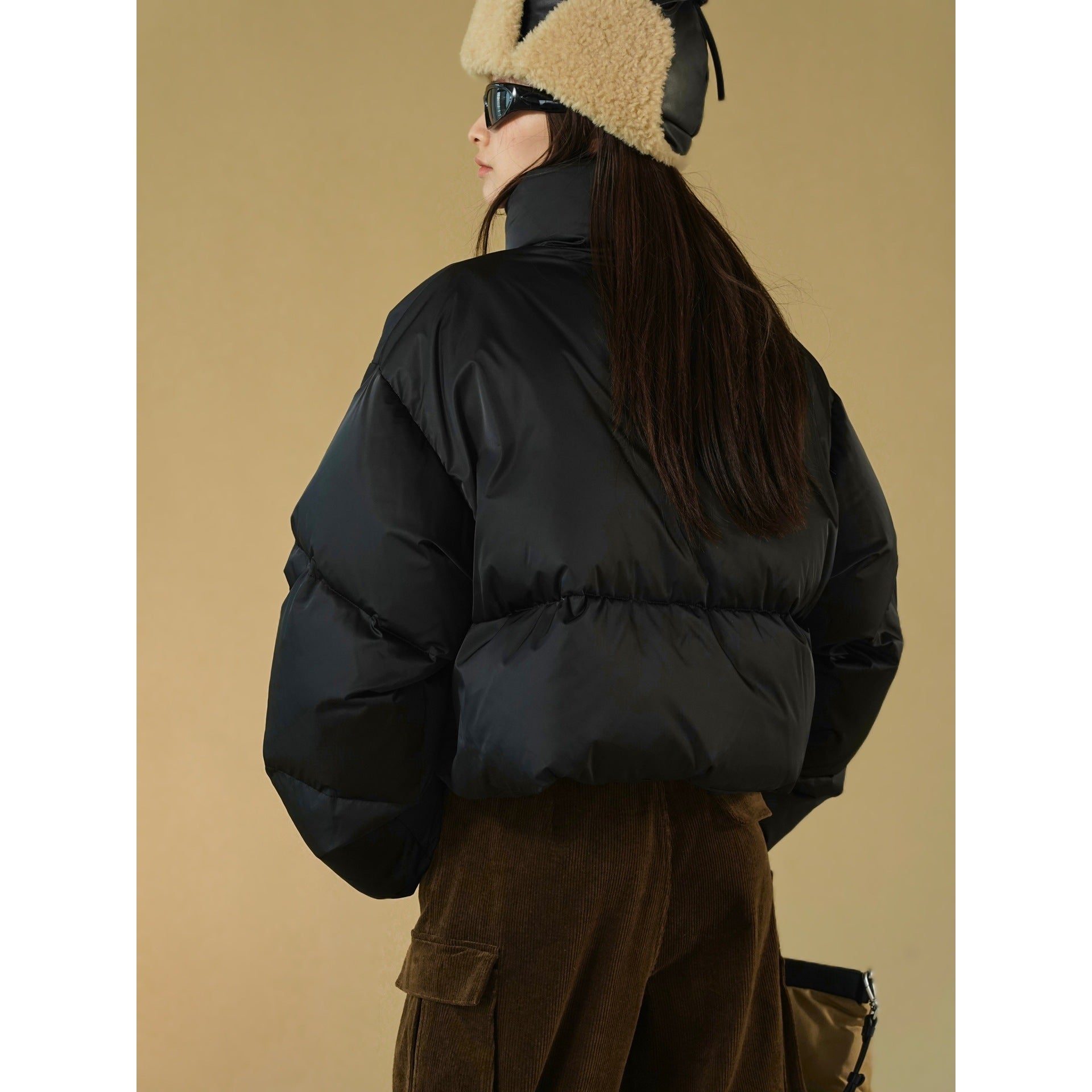 Women's short quilted puffer jacket with high standing collar and insulating filling Chichicherry