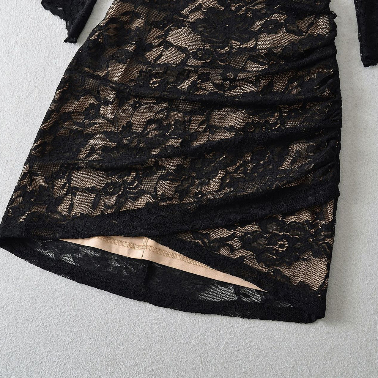 Women's lace wrap dress with trumpet sleeves and gathered silhouette Chichicherry