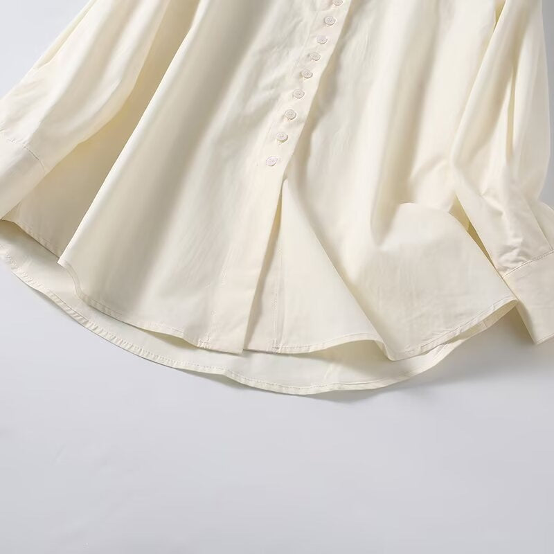 Women loose-fitting shirt blouse made of flowing material with continuous button placket Chichicherry