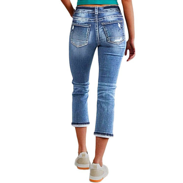 Women's cropped jeans with turn-up, mid-rise waist and used wash Chichicherry