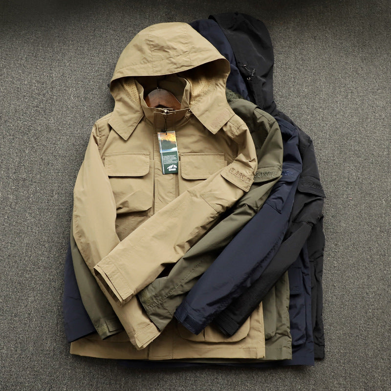 Men's urban field jacket with multiple pockets, wind-resistant surface and concealed hood Chichicherry