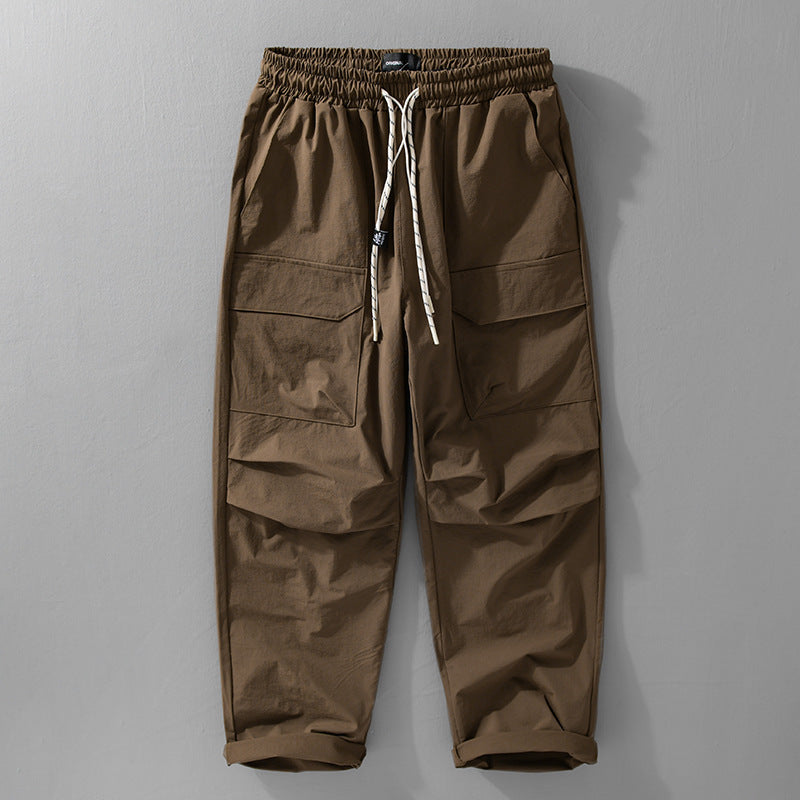 Men's Oversized Cargo Pants made of lightweight functional fabric with drawstring waistband and multiple pockets Chichicherry