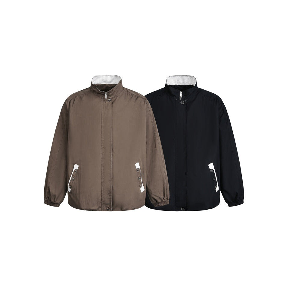 Unisex short-cut lightweight windbreaker jacket with standing collar, concealed zipper, and contrasting patch pockets Chichicherry