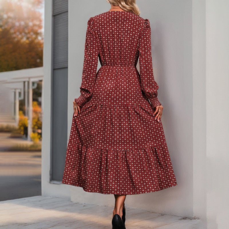 Women's midi dress in boho style with V-neck, button placket, cord tie waist, and tiered ruffle skirt Chichicherry