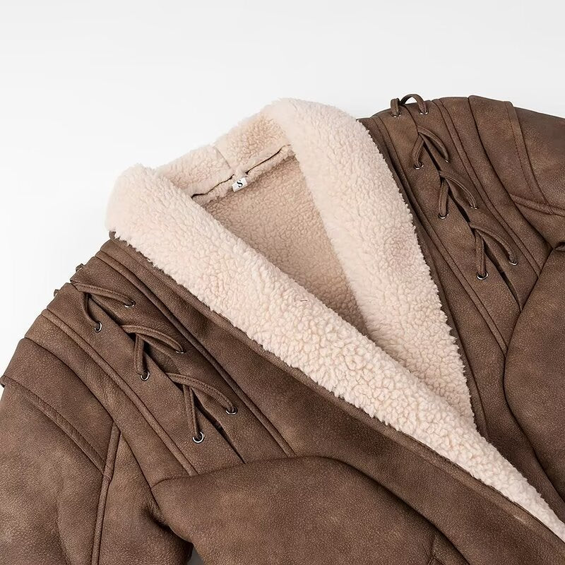 Ladies short jacket in aviator look with sherpa lining, tie belt and shoulder lacing Chichicherry