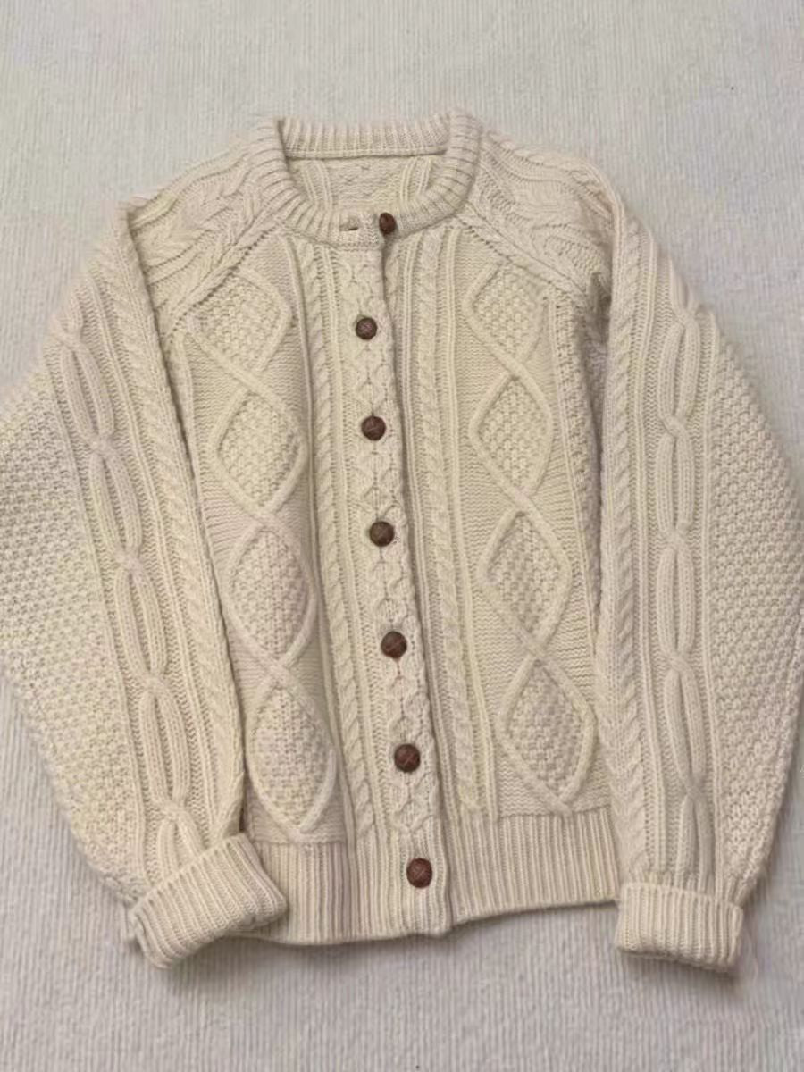 Women's knit cardigan in Aran style with braid and pearl pattern as well as wooden button placket Chichicherry