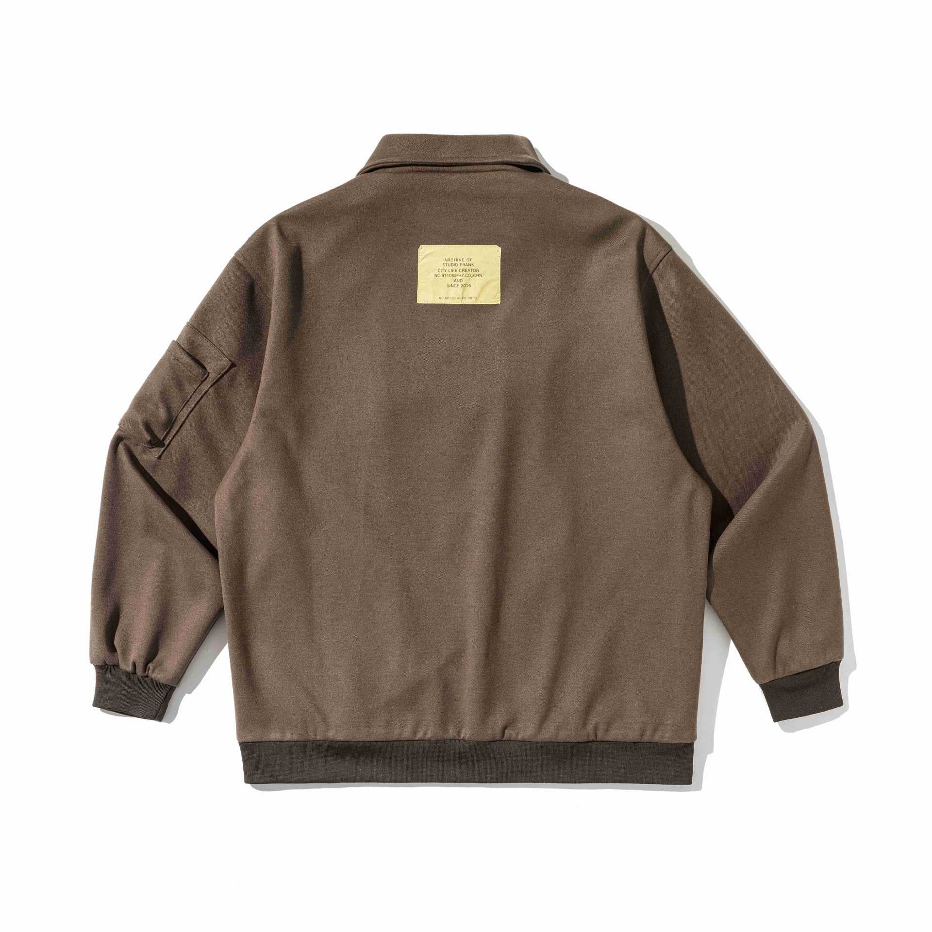 Men's short blouson in utility style with padded front, zip chest pockets and ribbed cuffs