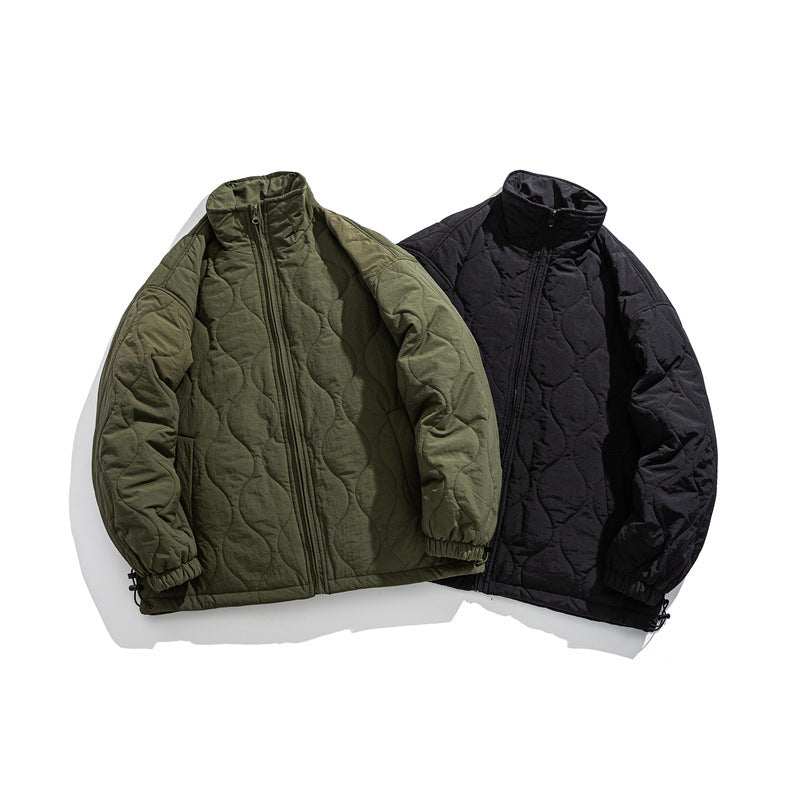 Unisex Boxy quilted jacket in military liner style with high stand-up collar and adjustable hem Chichicherry