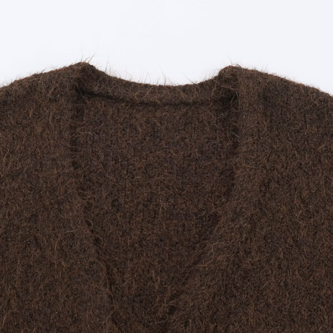 Women's Oversized Knit Coat with V-Neck, Cozy Boucle Look and Patch Pockets Chichicherry