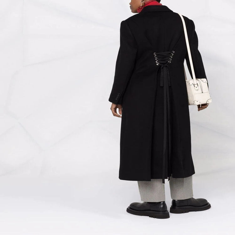 Women’s long coat in minimalist double-breasted style with tailored silhouette and flap pockets Chichicherry