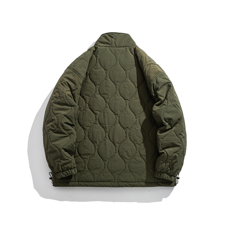 Unisex Boxy quilted jacket in military liner style with high stand-up collar and adjustable hem Chichicherry