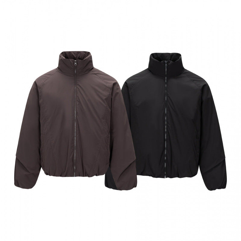 Unisex Short cut lightweight windbreaker in boxy cut with high stand-up collar and elastic hem Chichicherry