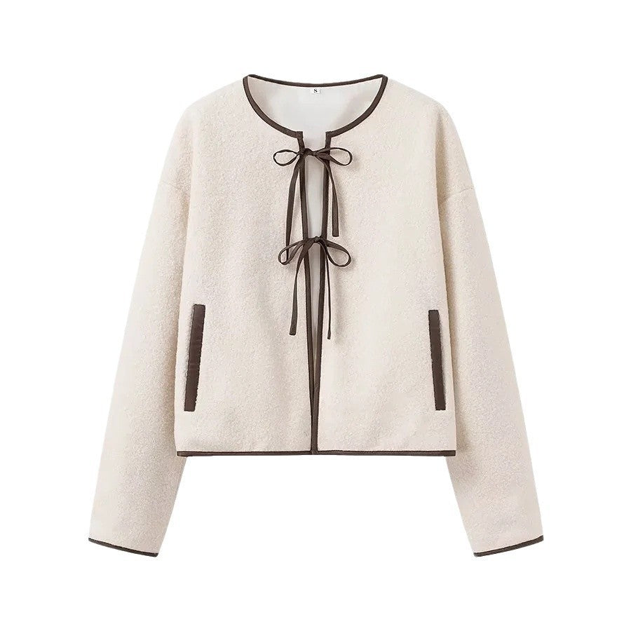 Ladies short cut teddy jacket with tie bands and contrast piping Chichicherry