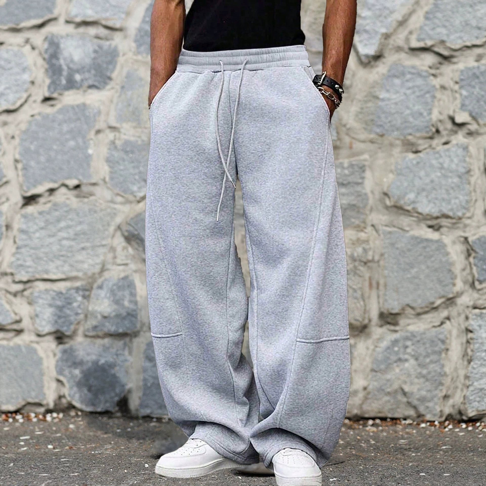 Men's loose sweatpants in baggy cut with elastic waistband, drawstring, and side pockets Chichicherry