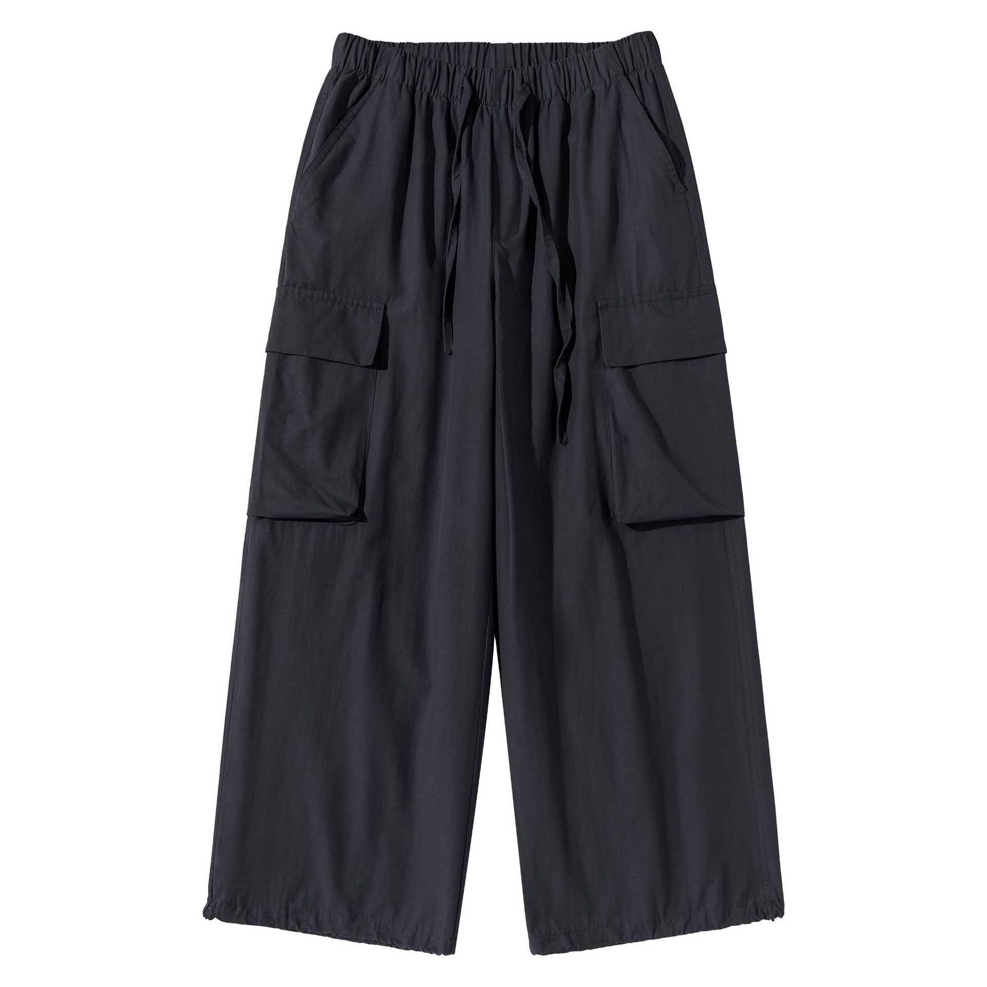 Women's culotte cargo bermudas in utility look with elastic tunnel drawstring waistband and large flap pockets.