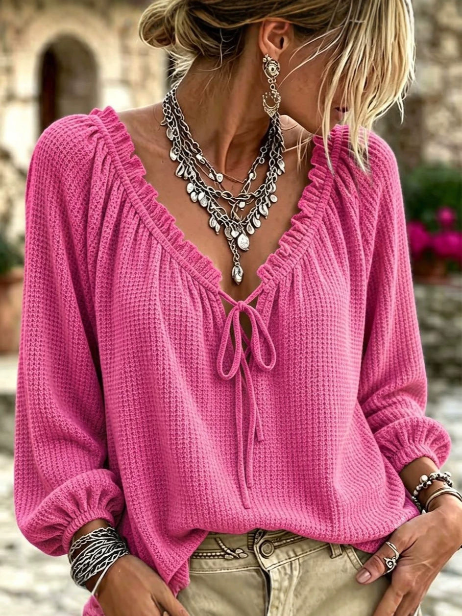 Women's waffle knit long sleeve with deep V-neck, ruffle trim and drawstring hood