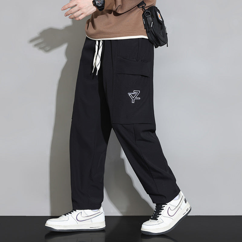 Men's loose-fitting cargo joggers with large flap pocket and drawstring Chichicherry
