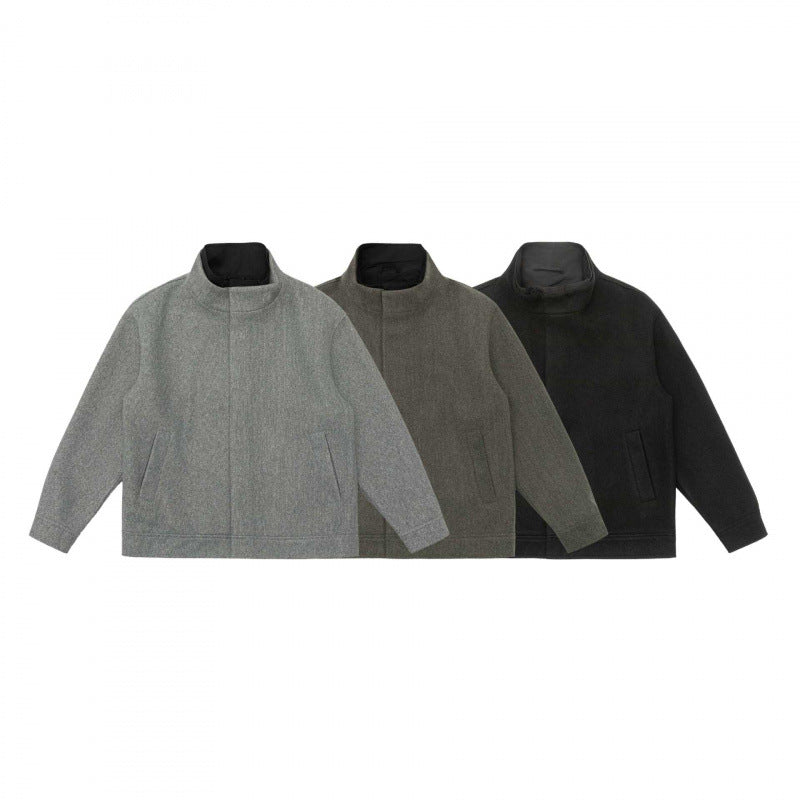 Men's short cut wool blend blouson jacket with standing collar, concealed button placket and simple silhouette Chichicherry