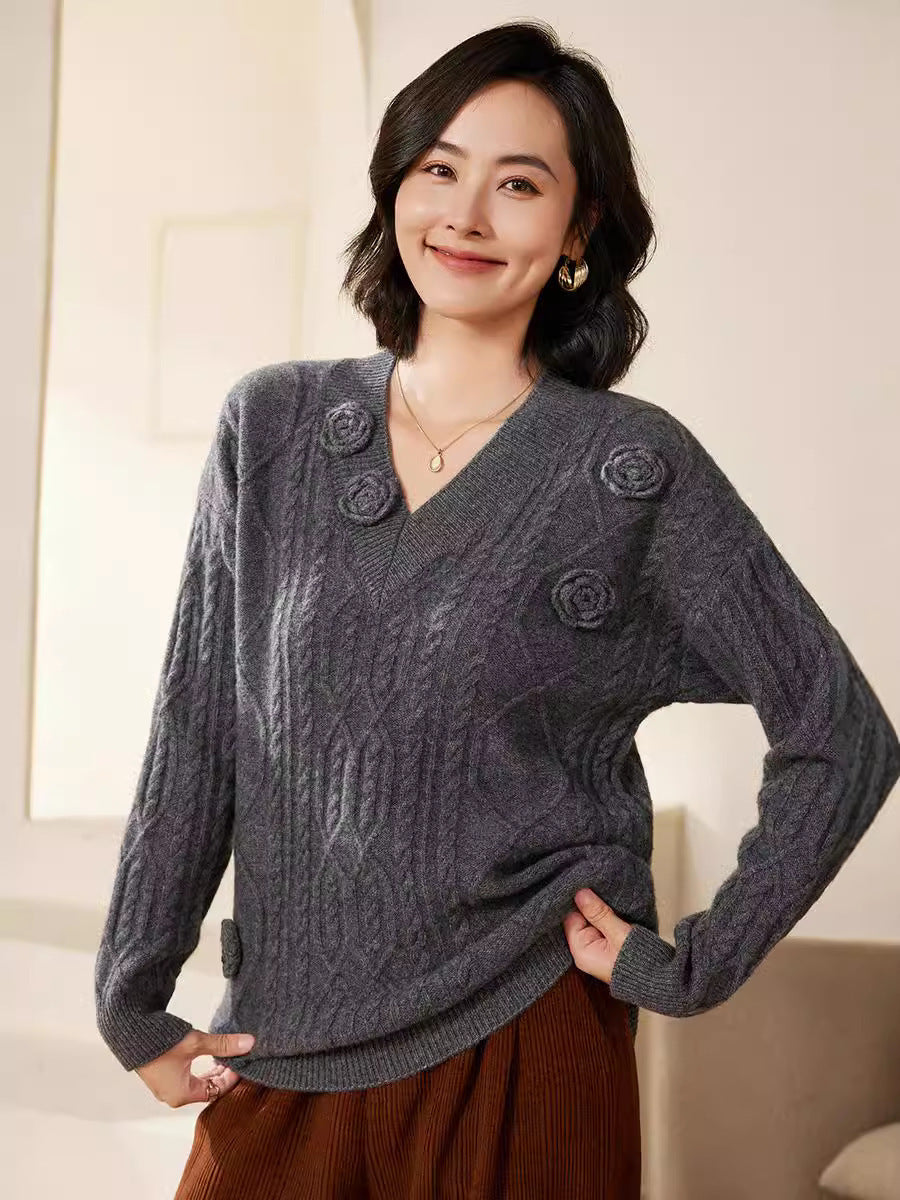 Women's cable knit V-neck sweater with three-dimensional floral appliqués made from soft wool blend Chichicherry