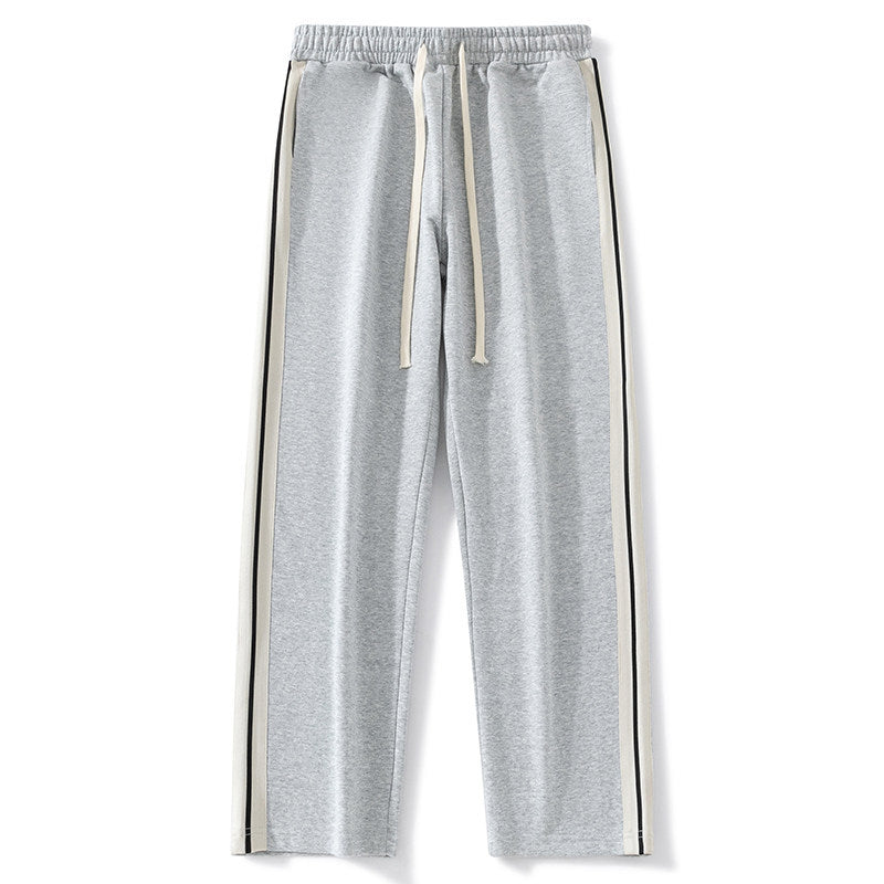 Men's loose-fitting joggers with elastic waistband, drawstring, and contrasting side stripes Chichicherry
