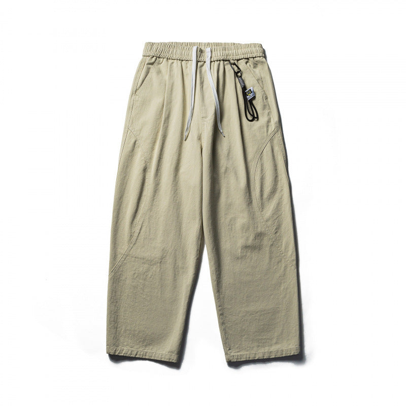 Unisex locker cut cropped leisure pants with elastic waistband, drawstring, and carabiner detail Chichicherry