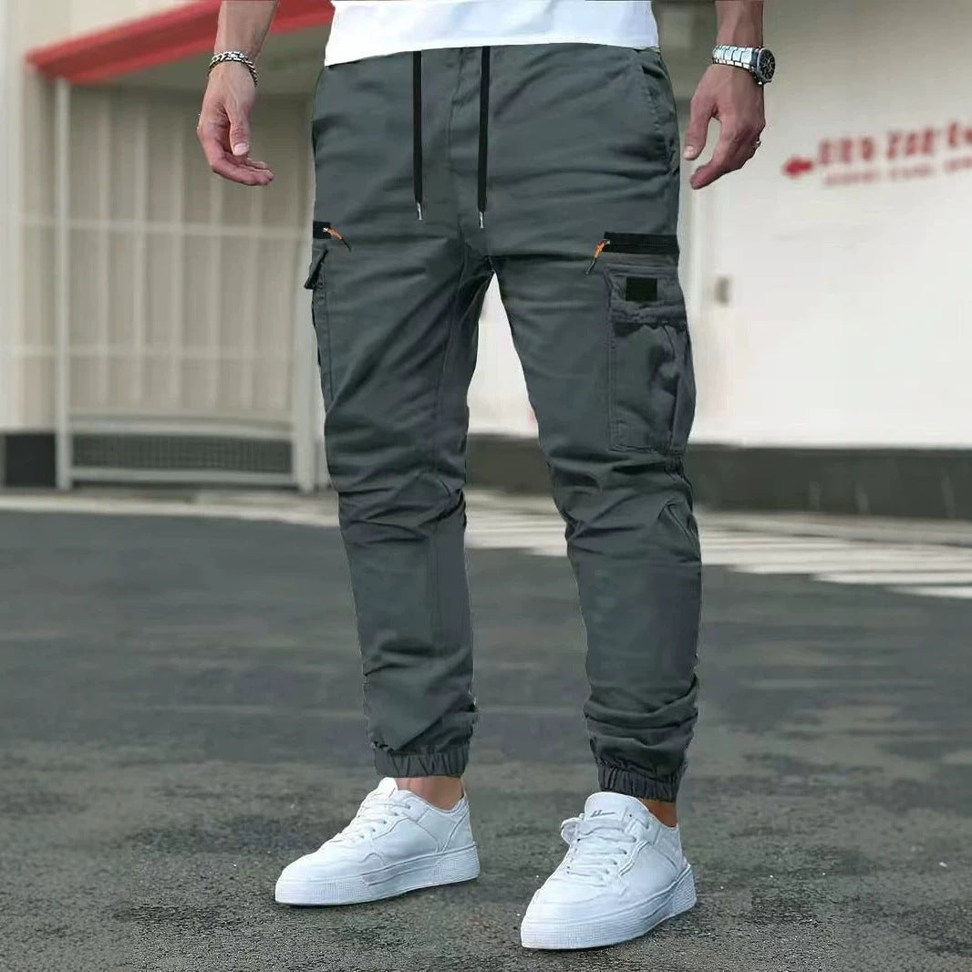 Men's Tapered Cargo Pants in Jogger Style with Elastic Waistband, Drop-Crotch Pocket & Zipper Pockets Chichicherry