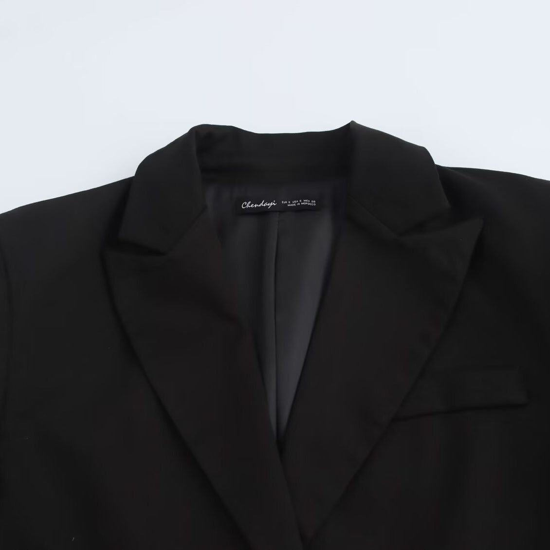 Women's Short Tailored Blazer with Notched Collar and Minimalist Silhouette Chichicherry