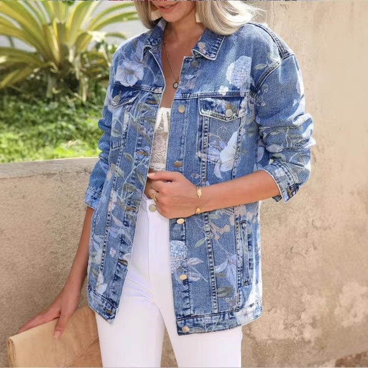 Women’s Longer Denim Jacket with Floral Allover Print, Chest Flap Pockets, and Casual Oversized Fit Chichicherry